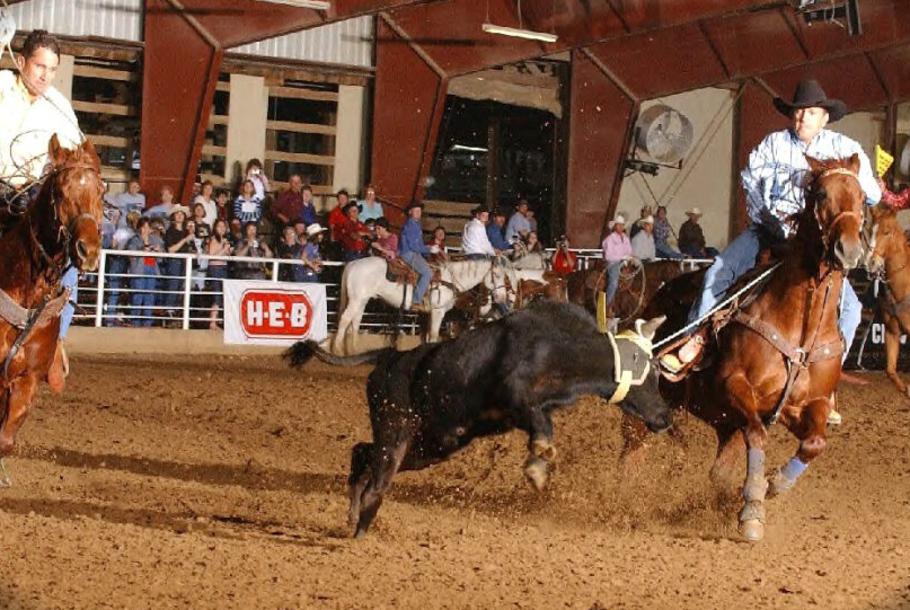 George as header and his partner Bret Beach, at the San Antonio Rose Palace, 2002.